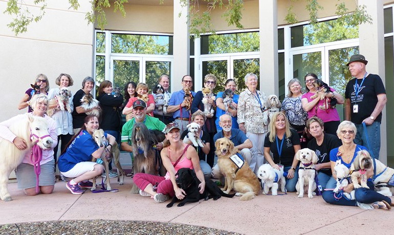 Group photo of HOV Pet Connections volunteers and their pets