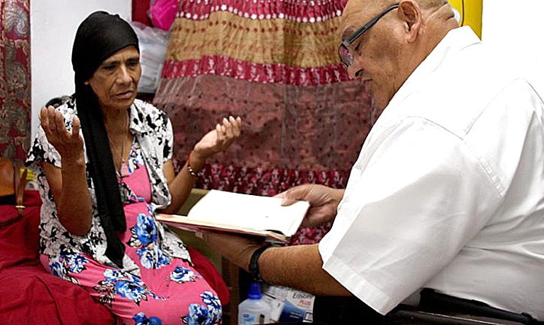 Chaplain with patient