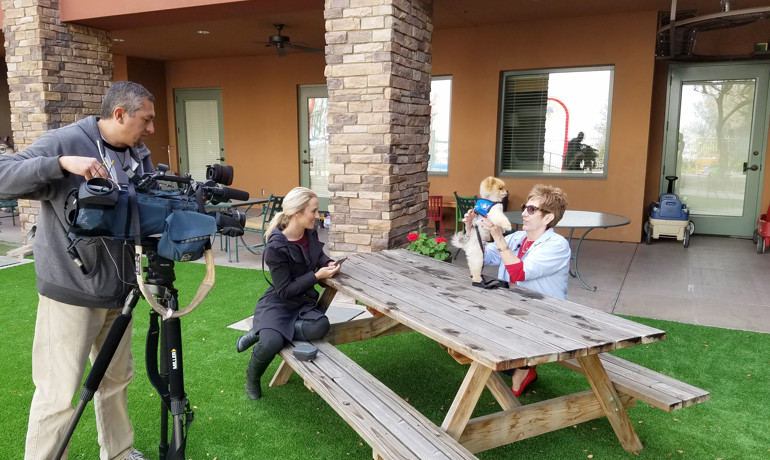 News interview with a cameraman, reporter and patient