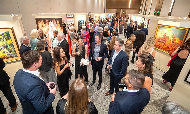 People walking about art gallery at aaha annual event