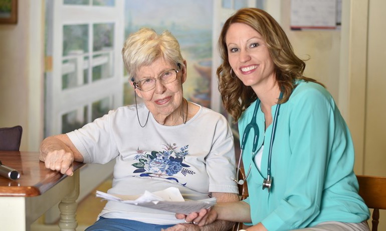 Nurse helping patient