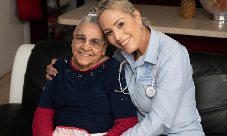 RN Erica Coronado hugging patient Isidora Dominguez